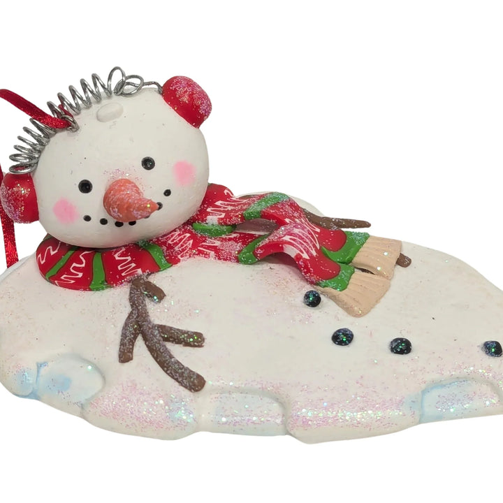 Melting Snowman Ornament Wearing Red Ear Muffs